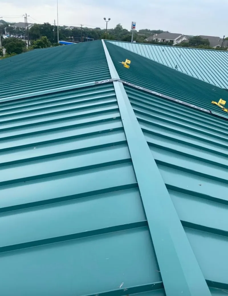 Green commercial metal roof ridge and valley for Metal Roof Repair in Coolbaugh